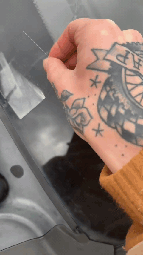 Peeling the curing film and blading the repair flush